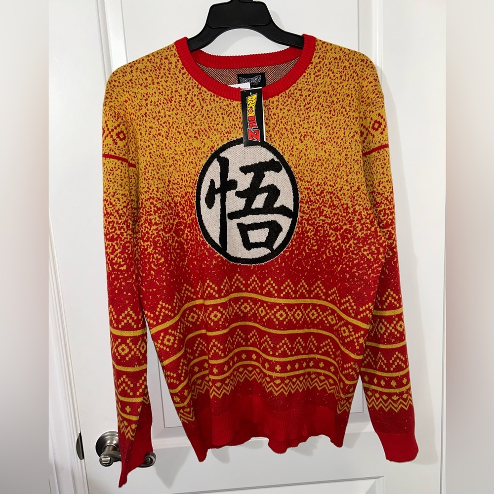 Vibrant Red and Yellow Crewneck Sweater with Geometric Patterns